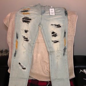 DNA MENS DENIM JEANS WORH BLACK/GOLD PAINT SPLATTER.